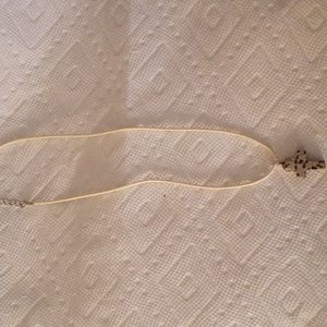 Yellow spotted cross necklace
